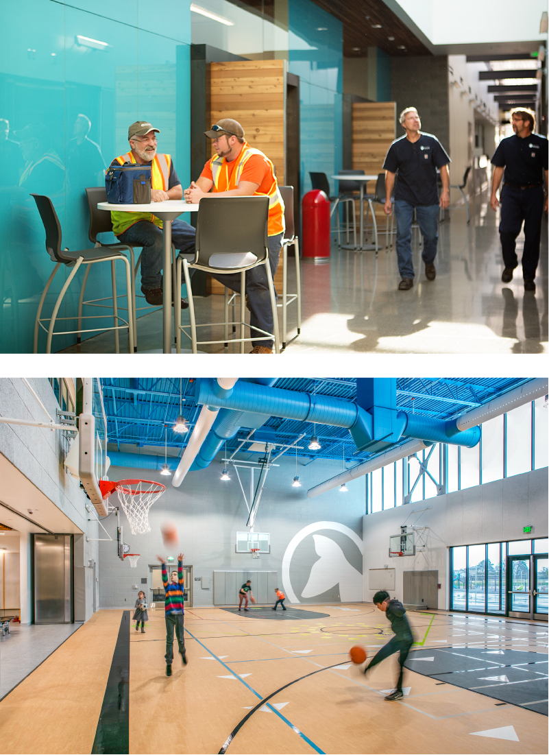 Two men sitting at a table and children playing in a gym.